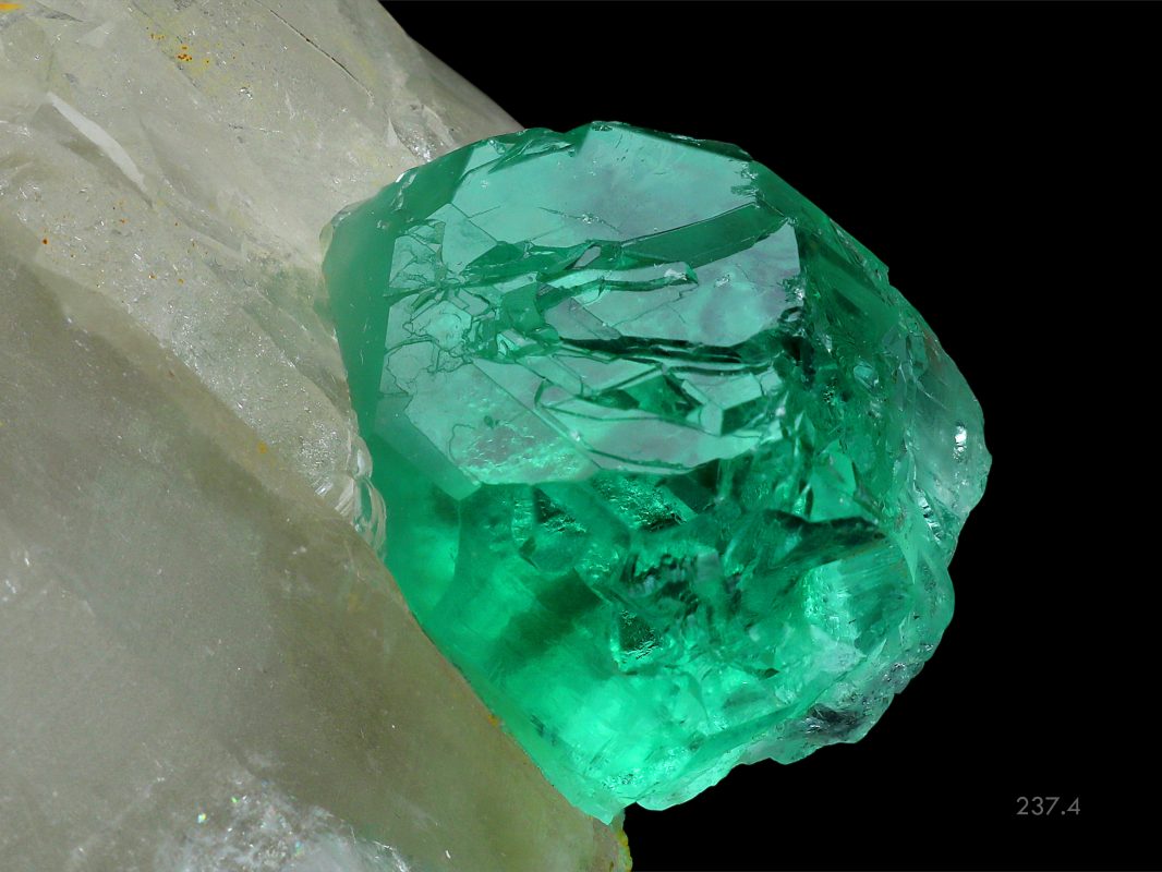 Green Fluorite Ball Perched on Quartz Photo