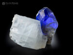 A fine gem Tanzanite crystal with calcite from Tanzania.