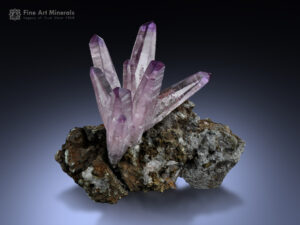 A fine-quality amethyst cluster on a matrix from Mexico.