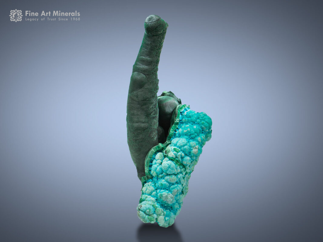 This specimen features malachite on Chrysocolla from the Democratic Republic of the Congo.