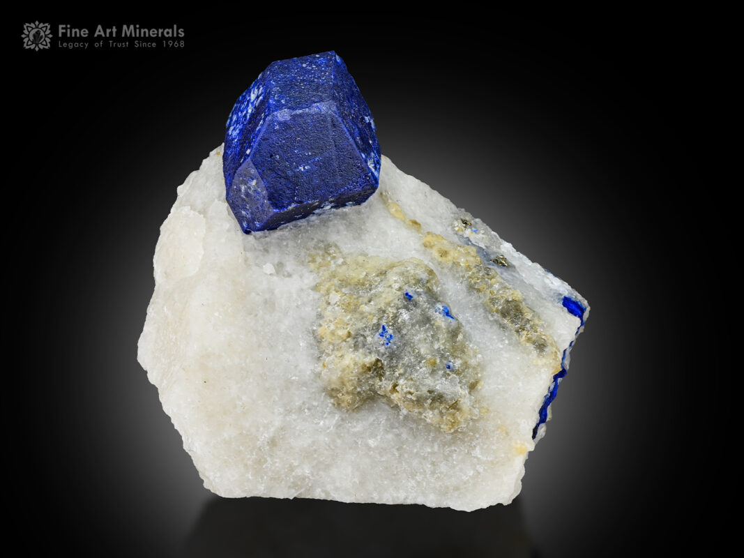 A lovely crystal of lazurite on matrix from Ladjuar Medam, Sar-e-Sang, Kuran wa Munjan District, Badakhshan, Afghanistan.