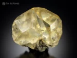 A super gemmy floater calcite crystal from Sokolovskoe Mine, Kazakhstan. Golden hue, sharp form, and brilliant clarity in a fully terminated 383 g display specimen.