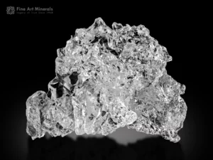 Transparent etched pollucite crystal cluster with intricate surface patterns from Afghanistan