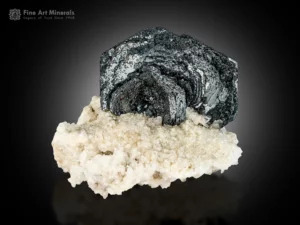 Alpine-style hematite “Iron Rose” fine mineral specimen with rose-shaped crystals on albite matrix.