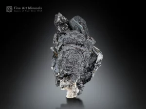 Metallic hematite crystals showing steel-gray luster and layered growth with partial crystal faces