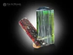 thumbnail specimen of red mangano tantalite crystal with bright green tourmaline and mica from Pakistan