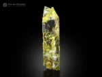 Transparent yellow triphane crystal from Afghanistan with etched terminations and glowing color under light