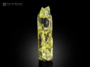 Transparent yellow triphane crystal from Afghanistan with etched terminations and glowing color under light