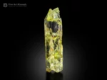 Transparent yellow triphane crystal from Afghanistan with etched terminations and glowing color under light