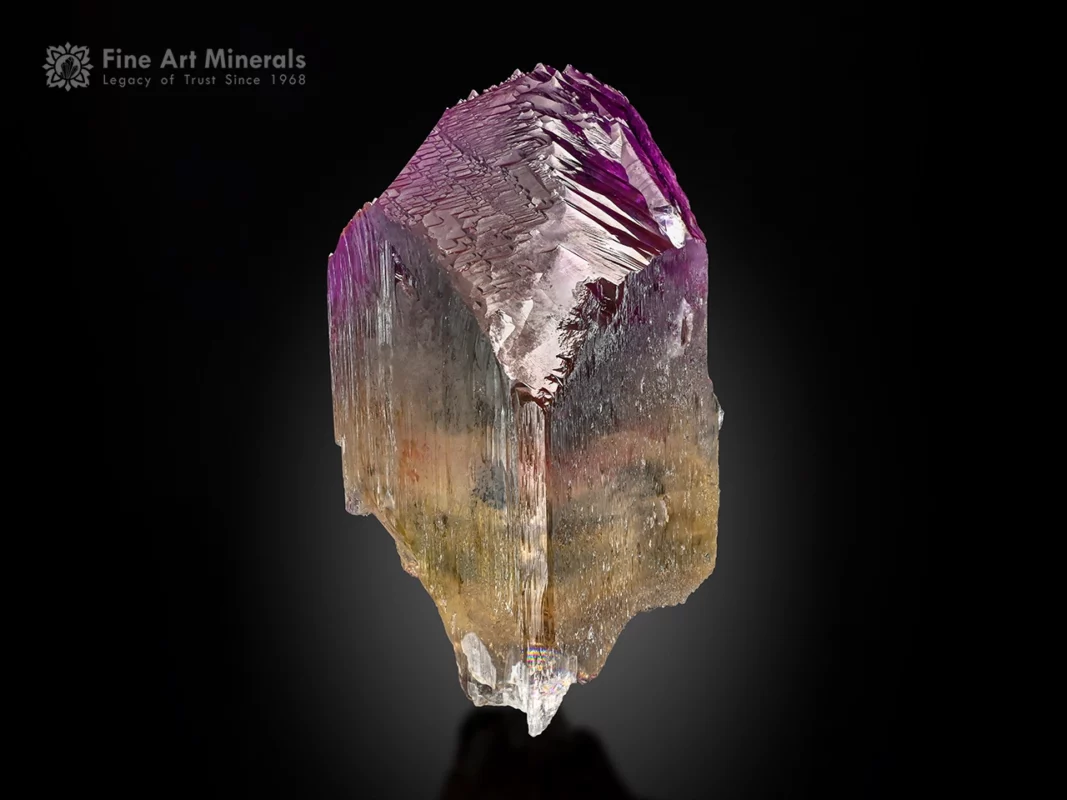 Afghan Kunzite crystal with sharp termination, vivid purplish-pink zoning, and exceptional clarity.
