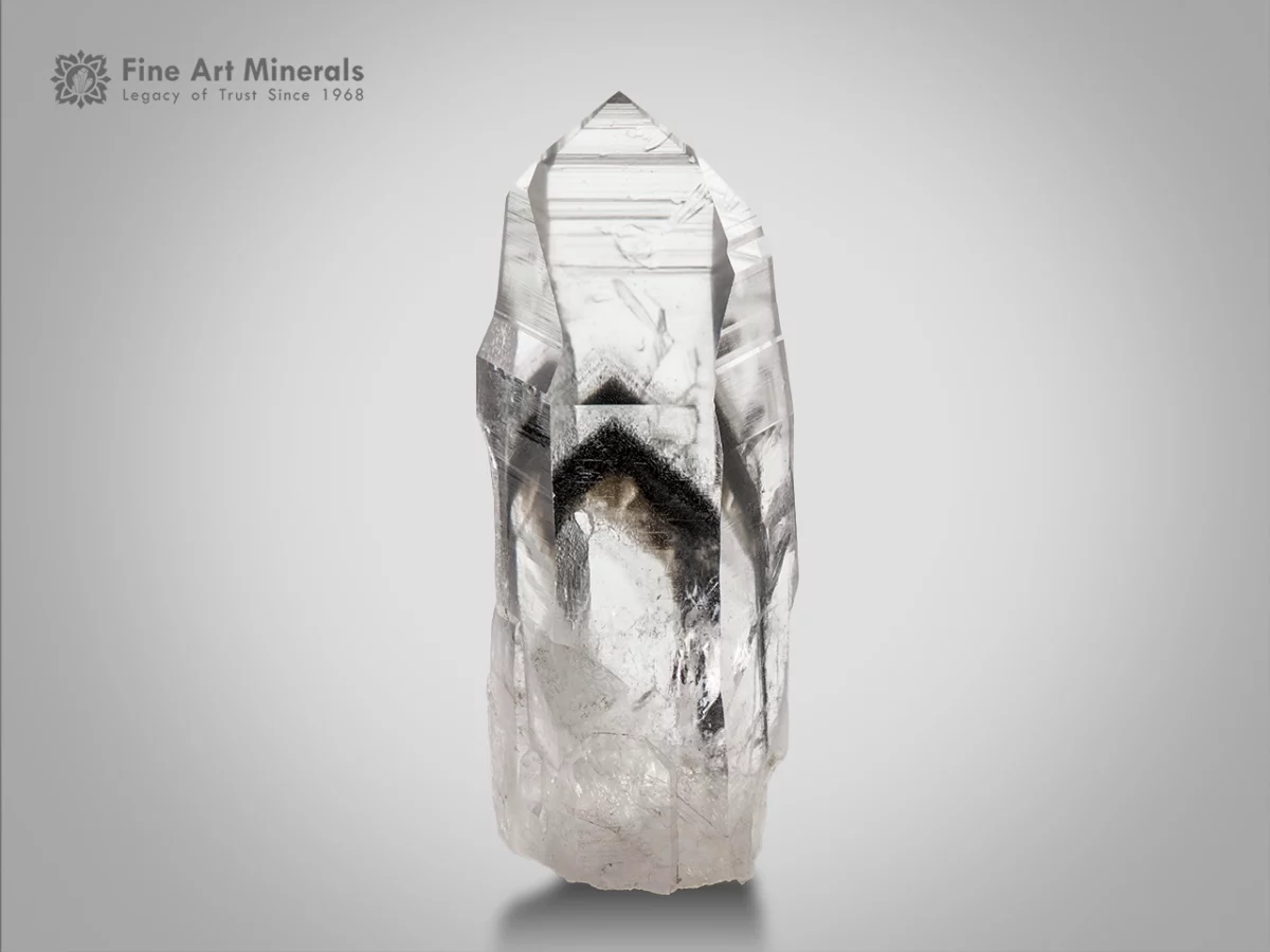 Quartz with black Chlorite inclusion from Madagascar — large cabinet crystal with superb clarity and sharp terminations.