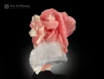 Rhodochrosite with Quartz and Albite from Shigar Valley, Pakistan — small cabinet specimen with sharp-bladed pink crystals.