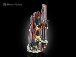 Fiery red rutile crystals with dark green aegirine and white albite from Zagi Mountain, Pakistan.
