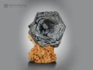 Sharp, metallic hematite with an albite matrix, self-standing, showing six-sided faces from Tormiq Valley, Pakistan.