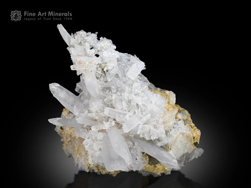 Cabinet specimen of vitaniemiite with a large 4.2 cm crystal and sharp white clusters on the matrix