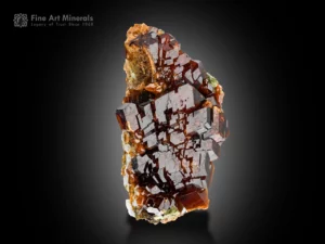 Amber andradite garnet with sharp faces and bright luster.