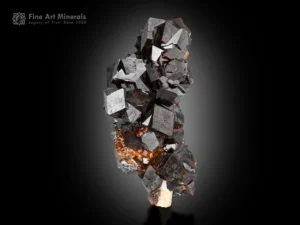 Sharp reddish-brown andradite garnet cluster with bright glassy luster from Kharan, Pakistan.