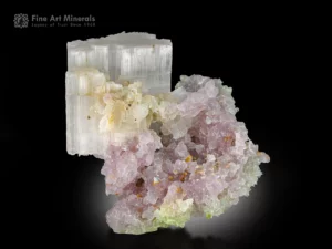 Beryllonite with green Tourmaline and pink Lepidolite from Chhappu, Braldu Valley, Pakistan — cabinet specimen with rare color contrast.