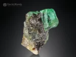 Fine emerald crystal showing vivid green color, bright luster, and sharp edges on natural matrix from Swat, Pakistan