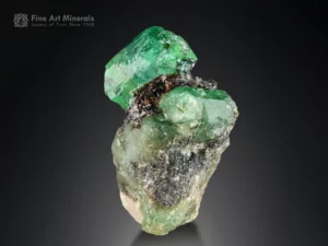 Fine emerald crystal showing vivid green color, bright luster, and sharp edges on natural matrix from Swat, Pakistan
