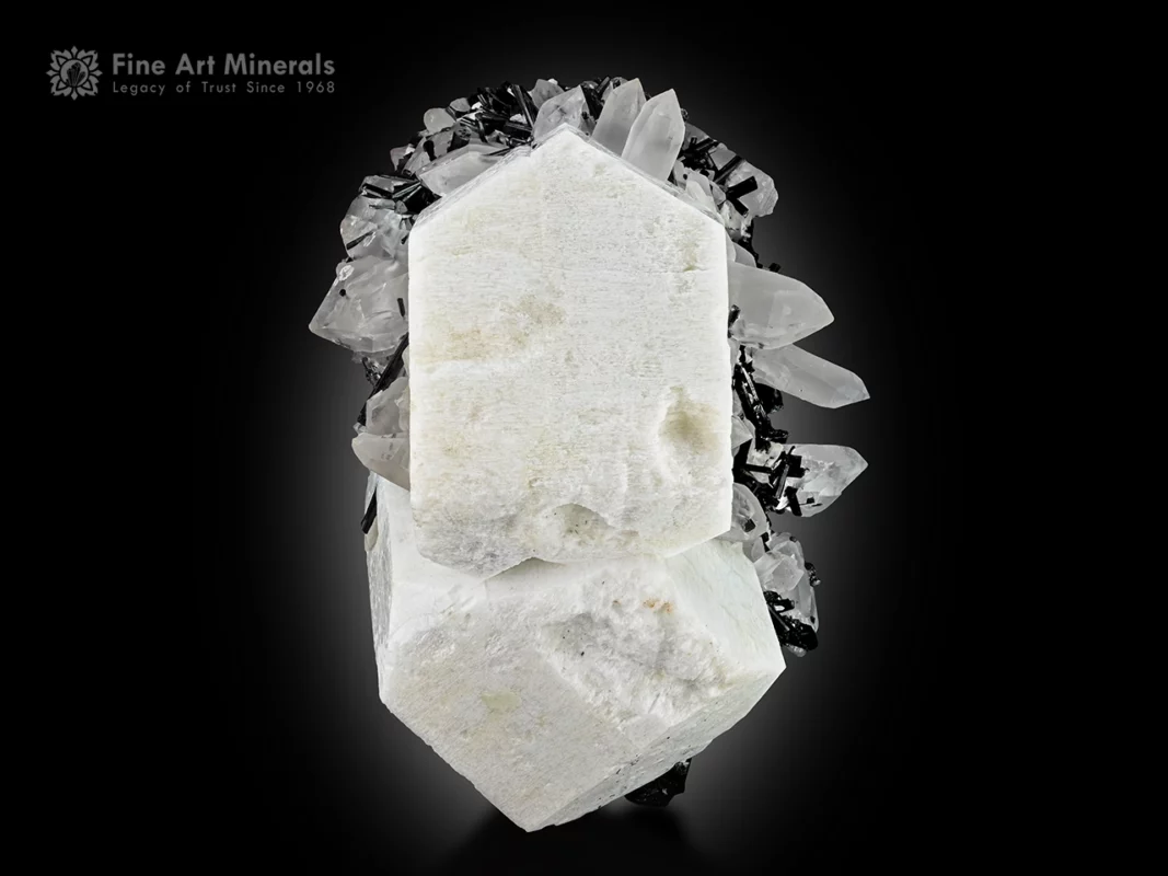 Fine feldspar crystal with black schorl and clear quartz points from Goand Mine, Shigar Valley, Gilgit-Baltistan, Pakistan.