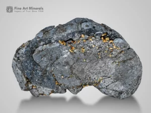 Metallic hematite crystal with silver-gray luster.