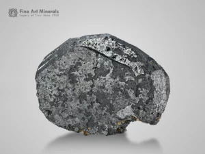 Metallic hematite crystal with silver luster.