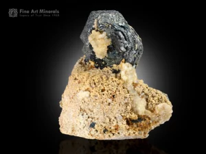 Metallic hematite crystal with creamy albite cluster.