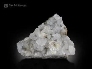 Transparent petroleum quartz crystals with yellow inclusions on a calcite matrix from Buhirmas, Pakistan.