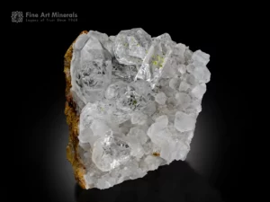 Transparent petroleum quartz crystals with bright yellow inclusions on white calcite matrix from Buhirmas, Balochistan, Pakistan.