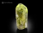 Yellow-green triphane crystal with bright luster and sharp termination.