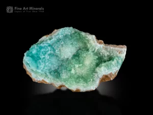 Aqua green aragonite crystal cluster with radiating formations from Afghanistan.
