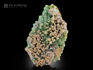 Green aragonite crystal cluster with calcite and azurite from Afghanistan.
