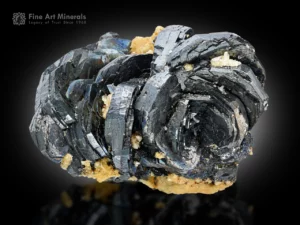 Cabinet-size hematite rosettes with albite and golden matrix from Pakistan, showing iridescent surfaces.