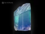 Natural kunzite crystal displaying vivid blue and green color zoning with bright clarity and textured termination.