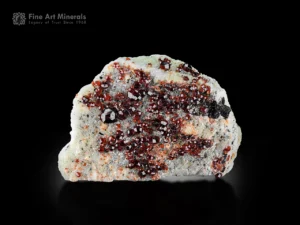 Spessartine garnet crystals on feldspar matrix, Pakistan.