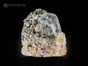 Beryl var. Goshenite crystal with apatite and muscovite on a natural matrix, self-standing display.