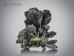 Epidote cluster with sharp-bladed crystals and high luster from Pakistan.