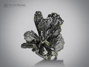 Epidote cluster with sharp-bladed crystals and high luster from Pakistan.