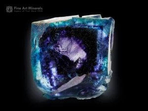 Deep blue and violet fluorite crystal from China with vivid zoning and intense internal luminosity.