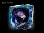 Deep blue and violet fluorite crystal from China with vivid zoning and intense internal luminosity.
