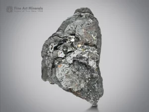 Metallic hematite specimen with layered crystal faces and fine sagenite coating.