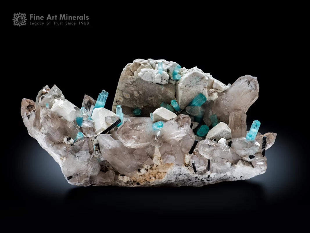 Monumental aquamarine crystals on quartz, feldspar, albite, and schorl from the goand mine in Pakistan.