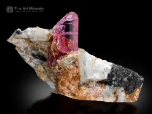 Vivid pink topaz crystal with pink lavender color on white matrix from Afghanistan