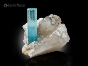 Gemmy aquamarine crystal with sharp termination on lustrous quartz and albite matrix.
