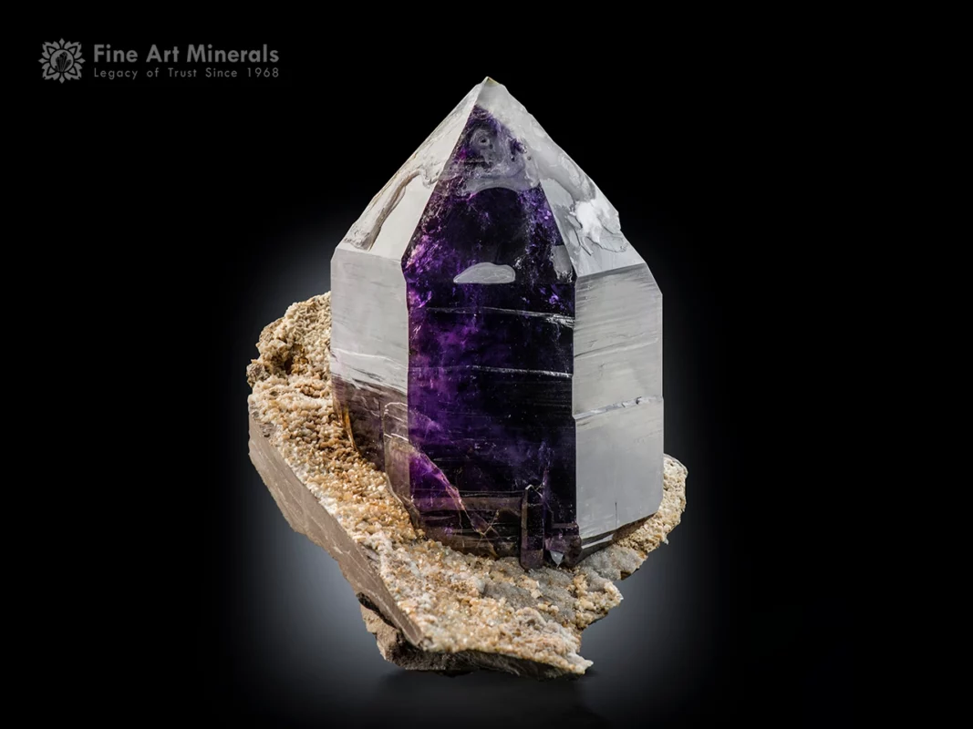 Large Namibian amethyst crystal with sharp termination and deep purple color