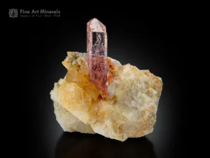 Gemmy pink topaz crystal on matrix from Pakistan with superb clarity and rich pink color.