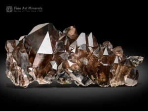 Smoky quartz cluster with rich smoky color and chlorite phantoms from Khaplu Saltoro Mine, Pakistan.