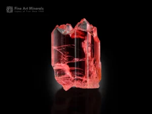 Salmon pink vayrynenite crystal with etched termination and high clarity