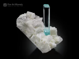Gemmy blue aquamarine crystal with superb clarity, standing on white albite and quartz matrix from Pakistan.